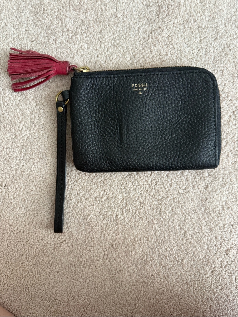 Fossil Black Pebbled Leather Wristlet with Red Tassel Accent